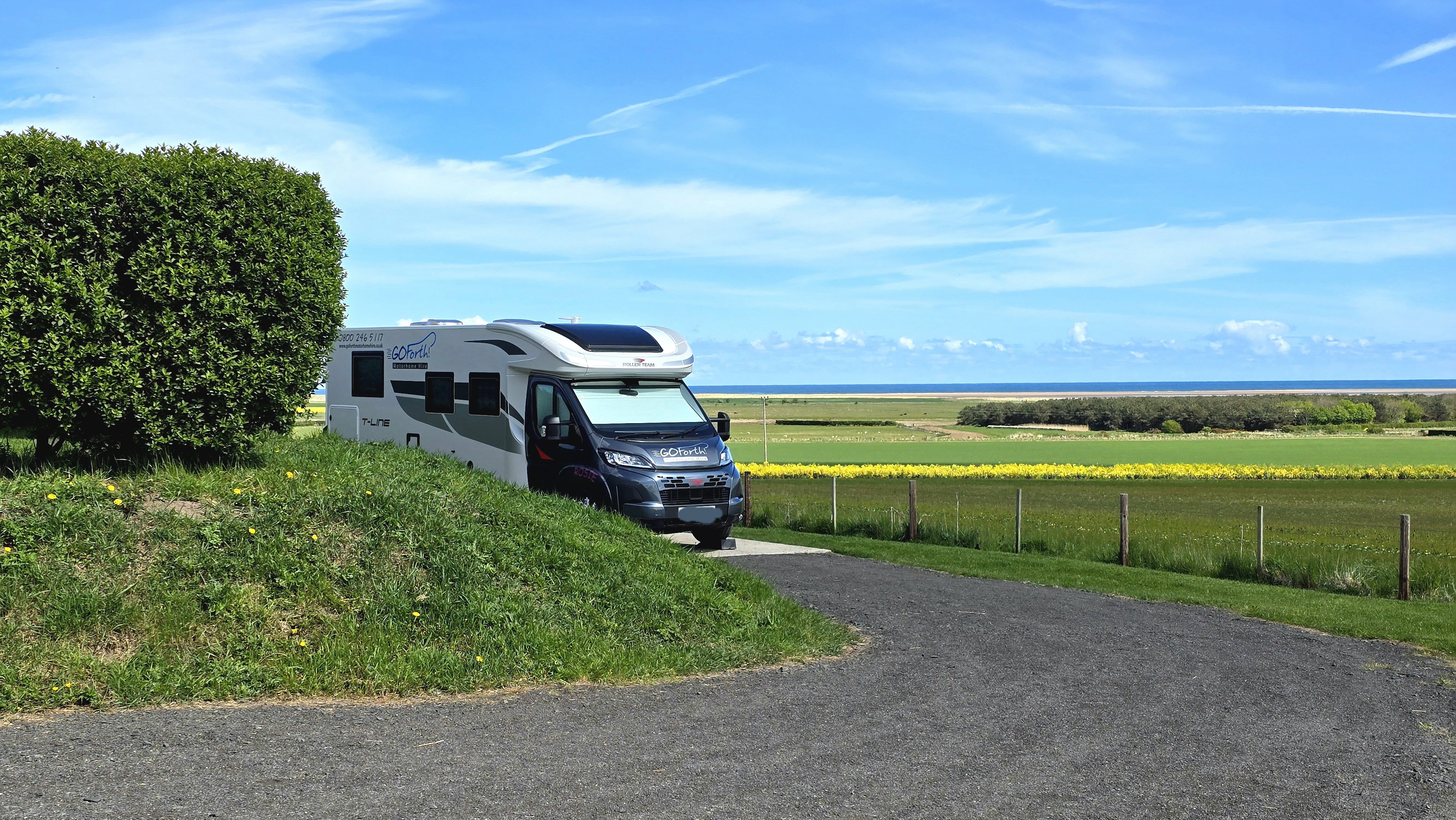 Pitch H16 witth Goswick Beach in the background